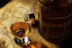 whiskey and bourbon glass on table